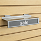 Silver and black metal slatwall footwear shelf with built-in sign holder for retail shoe displays