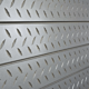 Silver Diamond Plate Textured Slatwall Panels measure 3/4''D x 2' Hx 8'L' with grooves spaced 6'' apart.  Textured slatwall panels come complete with paint matched aluminum groove inserts for added strength.