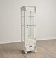 White double-sided curio is perfect for showcasing your items in a sleek and modern way. The glass shelves are adjustable and the locking glass doors help keep valuable items secure while adding an extra layer of security. The LED lighting ensures that yo